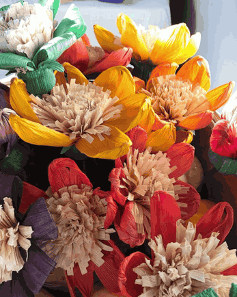 A bunch of Bright Colored Corn Husk Flowers